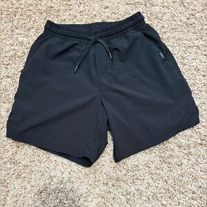 Men's UNRL black Stride Short 7.5” size small